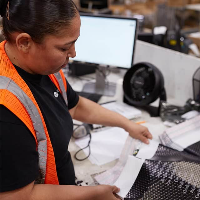 Boxzooka worker ships out a DTC order